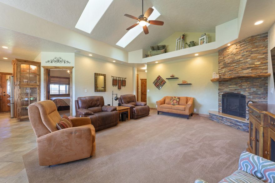 Take a moment to peruse the peaceful setting of this custom home. Located in a small acreage community, on a dead-end road, surrounded by rolling green pastures and a view of Barnes Butte. Custom home completed in 2018 includes 3 primary suites, main primary includes office space, access to wrap around porch. Bathroom with double vanities, jetted soaking tub, separate shower and large walk-through closet that takes you directly to the laundry room. Extra attention to detail in all the beautiful wood finishes throughout the home including custom cabinetry; additional custom features include built-ins with lighting, doors with immense character, cabinets with outlets to charge appliances and so much more! Builder thought of all the details with half bath in the garage/workshop; foundation at edge of wrap-around porch for easy addition to floor plan, spider insulation, finished attic storage with temperature control. Separate 40x30 insulated shop, 40x16 lean-and 40' storage container.