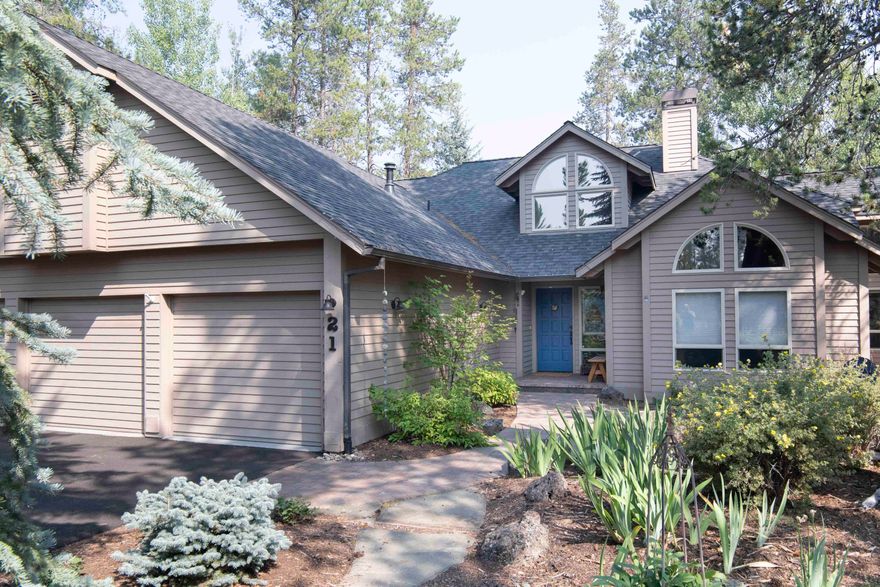 Escape to your own piece of paradise! This stunning home backs to the serene & picturesque Nat'l Forest where wildlife freely roam. For culinary enthusiasts, the kitchen is a dream come true w/ quartz counters, a spacious center island, SS appliances, a breakfast nook & breathtaking views! The main level boasts vaulted ceilings, creating an open & spacious ambiance. Enjoy cozy evenings by the gas FP w/ reclaimed brick surround, or head over to the great room, complete w/ a bar area & wood-burning Vermont Casting heat stove. With 4 bdrms, including 2 suites, this home offers plenty of space for guests. The main level primary suite features a modern bath w/ deck access & stunning landscaping views. The Trex deck is fully enclosed w/ a separate hot tub area. The lower level also boasts 2 guest bdrms & full bath, while upstairs offers a 4th suite & bonus area. Add'l features are 2.5car heated car garage, shed, central vac, new asphalt drive 2022, paver entry & new front landscape.