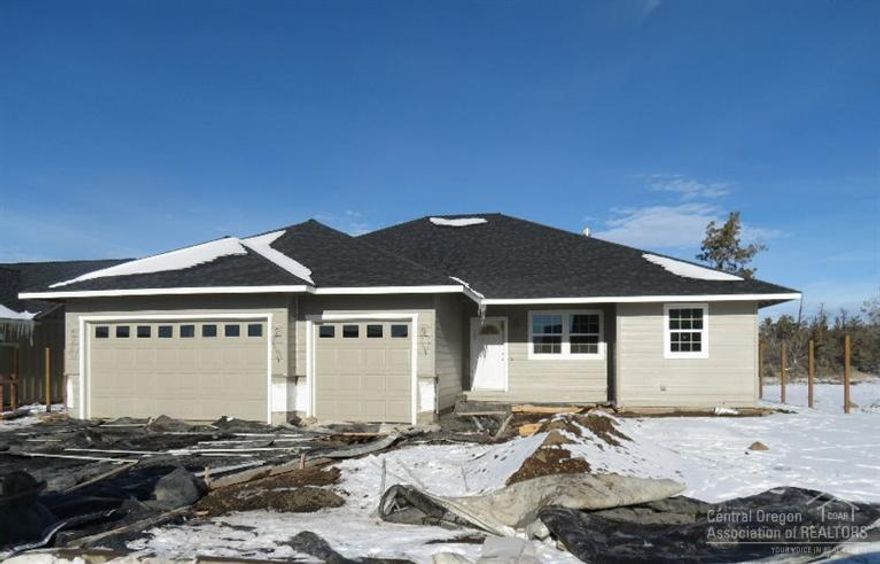 This home is in NW Redmond's premier neighborhood of Vista Meadows & it's in close proximity to the dry canyon trail. It offers 3 bedrooms, 2.5 baths & 2,020SF. The floorplan is very open & includes a great room, natural knotty Alder cabinetry & den/office. The kitchen features nook area, pantry, corner sink & wrap around eating bar. The bedrooms are spacious & allow for privacy through separation from master suite. An oversized 3 car garage, exterior stone work & front landscaping offer great curb appeal!