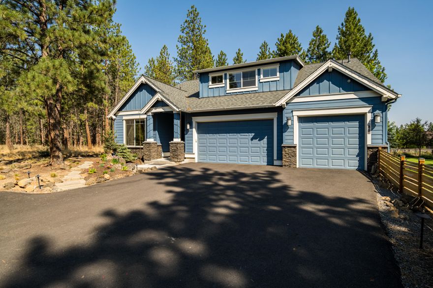 Take advantage of this spacious home close to town! Nestled on nearly 2.5 acres just outside Bend city limits, this modern home offers abundant natural light and breathtaking forest views blocks from Brookswood Meadow Plaza. The kitchen flows into the great room with a fireplace and opens to large paver patios and a newly cedar-fenced backyard. The main-floor primary bedroom has direct access to the patio and hot tub. Upstairs features a generous loft, a bedroom with a walk-in closet, a large bonus room, and an additional bathroom. Downstairs also includes two more bedrooms, a bathroom, a spacious pantry, a laundry room, and a 3-car garage. Outdoors, enjoy two expansive patios with a covered section, gas fire pit, built-in grilling area, and wood fire pit.  A detached 600 sq. ft. heated shop has a 360 sq. ft. guest suite, an outdoor covered patio, and a new RV parking pad. This is a must-see home.