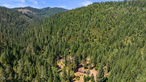 Tiny photo for 13245 Caves Highway, Cave Junction, OR 97523 (MLS # 220225867)