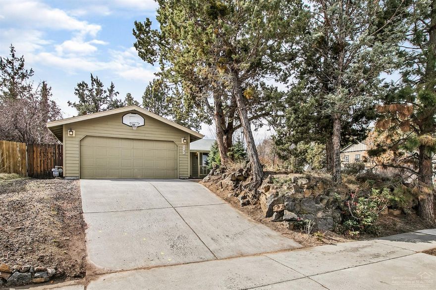 Adorable single level home in NE Bend is where you will find this awesome little home. 3 bedrooms, (3rd bedroom has no closet), 2 baths, updated kitchen with granite counters, tile back splash, stainless steel appliances even refrigerator is included, laminate wood floors in main living area, carpet in 2 of the bedrooms. Fully fenced and landscaped back yard, with a nice storage shed. Also there's a 2 car garage attached. Price to sell don't miss it.