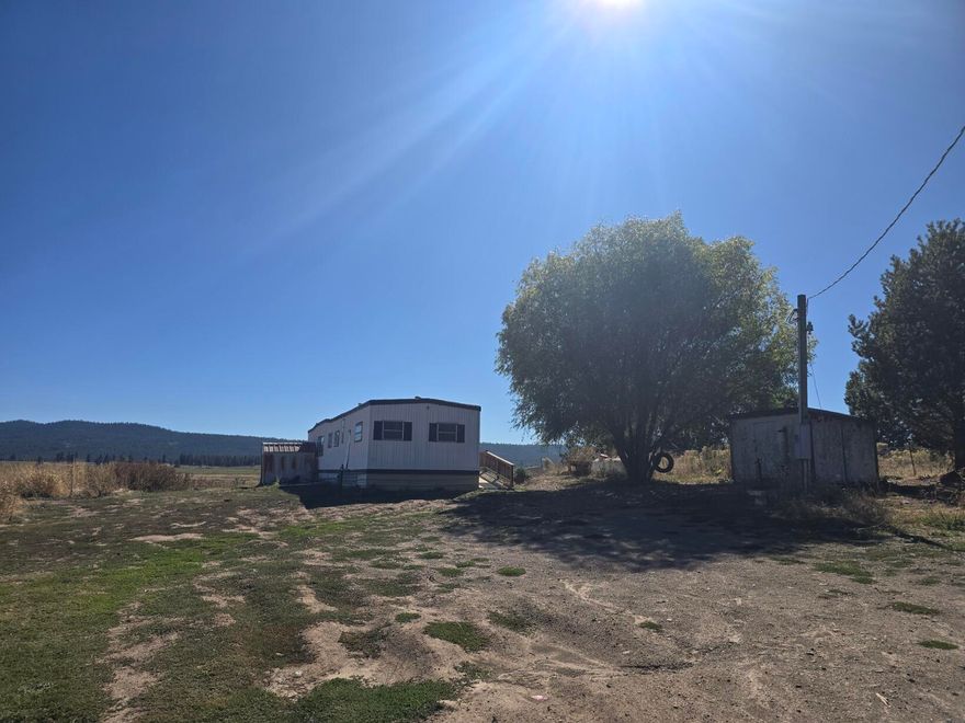 This 1.49-acre parcel offers stunning views of the Sprague River and surrounding mountains. It features well, septic, and power already in place, making it a great opportunity for someone looking to build their dream home in a picturesque setting. The property does require cleanup, and the 1972 manufactured home on the site is in disrepair and has been given no value. Don't miss out on this chance to create your own oasis in this beautiful location. Contact us today for more information.