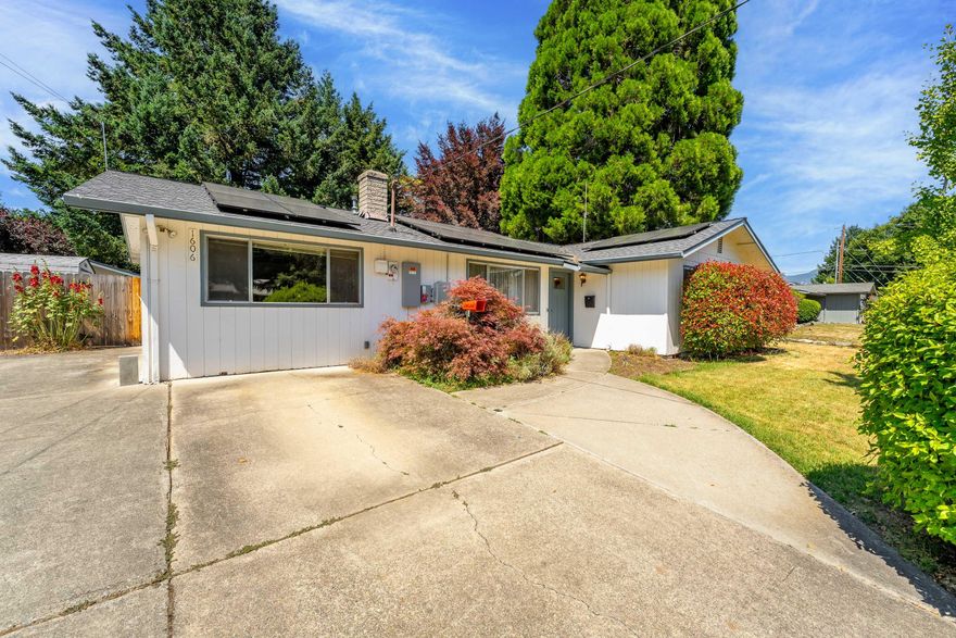 Discover 1606 Heather Dr! A well maintained for single-level home in a peaceful, desirable Grants Pass neighborhood. This spacious 3 bed, 2 bath home features two large living rooms filled with natural light, offering space to relax, entertain, or create a flexible layout. The kitchen offers ample storage and is conveniently located near the dining area for easy everyday use. The home includes two full baths and a functional floor plan throughout. Outside, enjoy a fully fenced backyard with mature landscaping, a gazebo, and two storage sheds. Located right next to the beloved All Sports Park and just minutes from shopping, schools, and the Rogue River. The seller is offering a $10,000 carpet allowance with an acceptable offer. Additional features include central heat and air, a newer roof, brand new solar panels, and a converted garage that provides extra living space—ideal for a home office, guest room, or hobby area. A great opportunity—schedule your tour today!