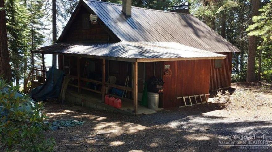 Great home right on Crescent lake with a dock - nice deck - Shared well with the neighbor - fireplace, Washer dryer - storage building, newer underground power - new flex piping through out home. DO NOT DISTURB OWNER - Partial ownership - shown by Appointment only!