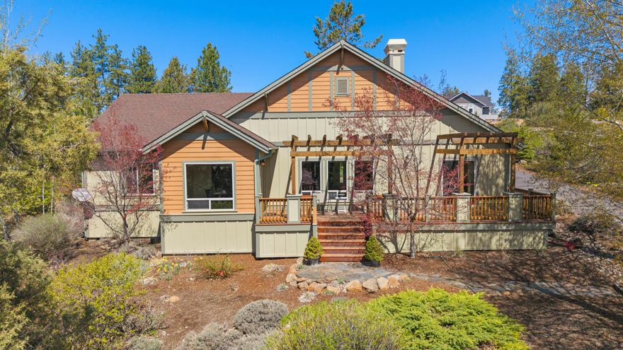 This beautifully maintained single-level 3-bedroom home with an office is nestled on a wooded, professionally landscaped lot with stunning multi-season blooms and year-round natural beauty. With no stairs into the home or inside, it offers effortless accessibility and comfort. Enjoy privacy, peaceful views, and nature's soundtrack from every window or the spacious deck. Large windows flood the home with light and bring the outdoors in. Inside, you'll find a thoughtful layout, warm finishes, and timeless charm throughout. A dedicated office offers space for work or creativity. Extensive under-home storage provides the perfect spot for seasonal items, keeping living areas clutter-free. While secluded, the home is just minutes from the resort entrance and amenities—offering the ideal blend of quiet retreat and convenience. Perfect as a full-time home, luxury getaway, or investment in tranquility. Don't miss your chance to own a slice of Southern Oregon paradise!