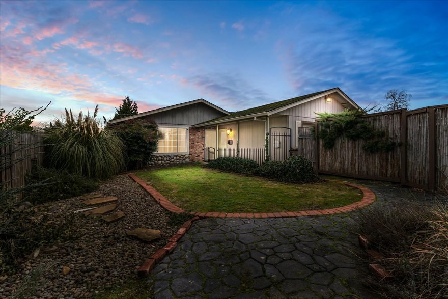 Charming single-level home in East Medford with brand-new carpet and private driveway! This property features a fully fenced yard, gated entry, and a mix of brick and stone accents. The bright living area boasts large windows, a skylight, and neutral tones. The versatile floor plan offers a spacious living room and room for personalization. The front yard has a beautiful stone pathway, and the backyard is perfect for gardening or entertaining. Conveniently located near schools, parks, and shopping, this home is move-in ready and full of potential. Schedule your showing today!