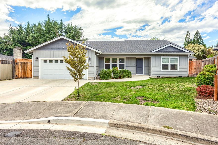 Home built in 2020 on a quite cul-de-sac. Open floor plan with 4 bedrooms, 2 baths and 2062 sq.ft. Very large formal dining room, kitchen with eating bar, granite countertops, pantry, gas range, wall oven and tile flooring. Large primary bedroom vaulted ceiling, slider out to the backyard, large bath with double sinks, granite countertops, tile floor, large shower double head and full body wash and large walk-in closet. Main bath has tub/shower, tile floors, granite countertops. Hardwood in great room and dining, carpet in the bedrooms. Small RV parking on the side. Backyard with inground Gunite heated salt water pool and hot tub Large double car finished garage and tankless water heater, and mini split heat/air in garage. New fencing in the back yard.  Video security all around the house will stay. Minutes to Asante Hospital.