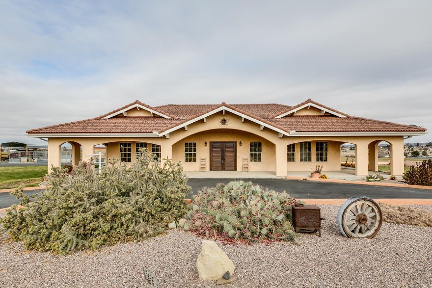 Make yourself at home on this privately accessed 51+ acre ranch with 2 spacious 4 bedroom homes! The main 2,964 sq ft home is a gorgeous U shaped Hacienda style home with ample lighting, vaulted ceilings, 2 master suites, all around beautiful features, 3.5. baths, and a courtyard looking out to the open field. The second home is 2,090 sq ft, bright and open, 2 full baths, has a large machine shed, and a carport. Enjoy the 45 irrigated acres, workshop, corrals, barn, and so much more! Call today for a showing.