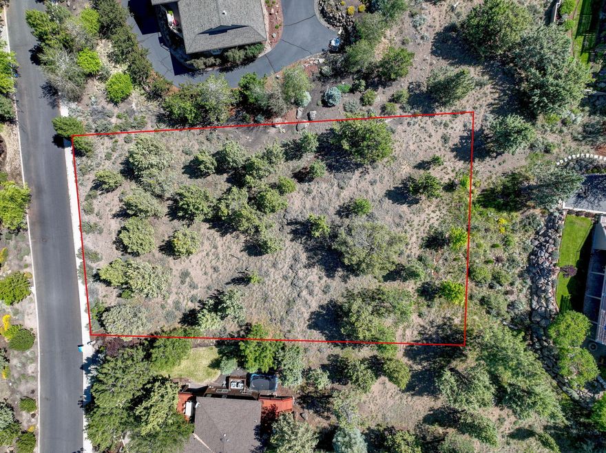 Build your dream home atop Awbrey Butte! This rare .53 acre homesite offers sweeping Cascade Mountain views—from Smith Rock to the Three Sisters—just minutes from downtown Bend, Shevlin Park, NW Crossing, dining, and golf. With public water, sewer, and gas available, plus native landscaping and a gentle southern slope, this lot is the perfect blank canvas for a custom residence. Enjoy the peace of a quiet neighborhood with outstand views. This parcel delivers significant potential in one of Bend's most coveted communities.
Ready to make it yours? Bring your architect and builder, or inquire about already approved plans, to design a home that captures the full beauty of Central Oregon's iconic landscape.