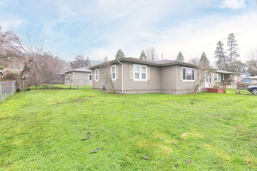 Remodeled 2 bedroom, 1 bath home in Northwest Grants Pass.  The interior has been updated including new carpeting, new kitchen appliances including gas range, custom blinds in all rooms, 4 ceiling fans with remote controls, new bathroom fixtures, interior and exterior paint, new vinyl windows and wood trim.  The living room is very large, with nice size bedrooms, plenty of storage, and a separate laundry room.  The roof is approximately 7 years old with new gutters.  The Property has a  brand new, detached, oversized 2 car garage, is fenced, and located on a small dead-end street with minimal traffic.  The property is connected to all city services.