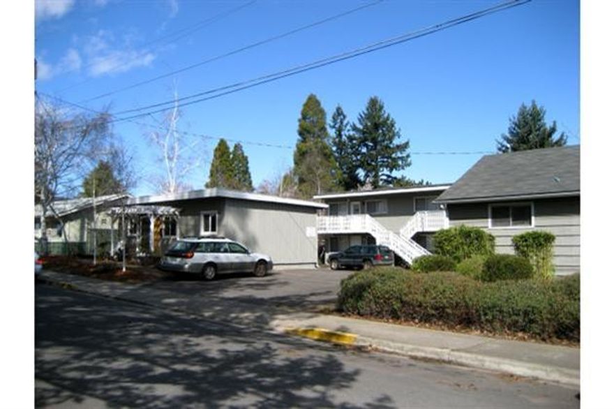 Very hard to find Ashland Multi Plex located at the corner of Bridge and Lee streets this very well maintained investment property sits just 1 block north of Southern Oregon University, with approximately 6,000 students and faculty combined. The 7 units have long term Tenants, and extremely low vacancy rate. All units include refrigerators and stoves, and some units have washer/dryer hook ups. And something rare in Ashland, Parking! 10+ off street parking spaces. Minimal maintenance. 48 hour notice required please.