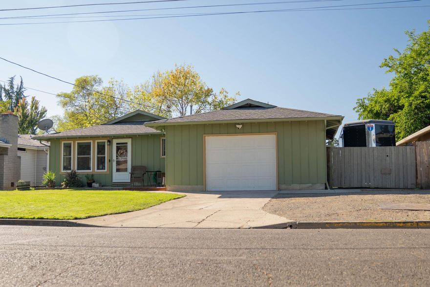 Welcome to 30 Ashley Place in Central Point! This well maintained 3 bedroom, 2 bath home offers 1,092 sq. ft. of living space with beautiful hardwood floors throughout. Recent upgrades include a new HVAC system installed in 2024, ensuring year round comfort and efficiency. The spacious backyard features a covered patio, perfect for relaxing or entertaining, plus a storage shed for your tools and toys. RV parking and a 1 car garage add convenience, while the neighborhood is just minutes from parks, schools, and shopping.