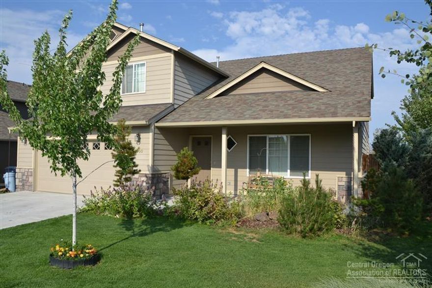 Must see this beautiful 4 bedroom home on quiet corner! Very clean residence, with open floor plan and vaulted ceiling. Garage boasts a built in work bench & cabinets. Fenced backyard with strawberry, blueberry, raspberry bushes plus an apple tree. This is a corner lot and backs acres of open fields with a view of Smith Rock. Side yard is big enough for RV or boat. Newer carpet and interior paint in the last 3 years.