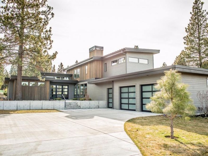 Beautiful contemporary home built by Timberline Construction located within the highly desirable Tetherow neighborhood. Great open floor plan with main level master and office/guest bedroom downstairs and two bedrooms and bonus up. High end kitchen with oversized pantry. 2 Laundry rooms,one on each floor. Oversized garage with ample room for 2 cars and 3rd garage bay for golf cart. Golf course membership included as part of sale. Abundant storage throughout as well as the convenience of central vac.