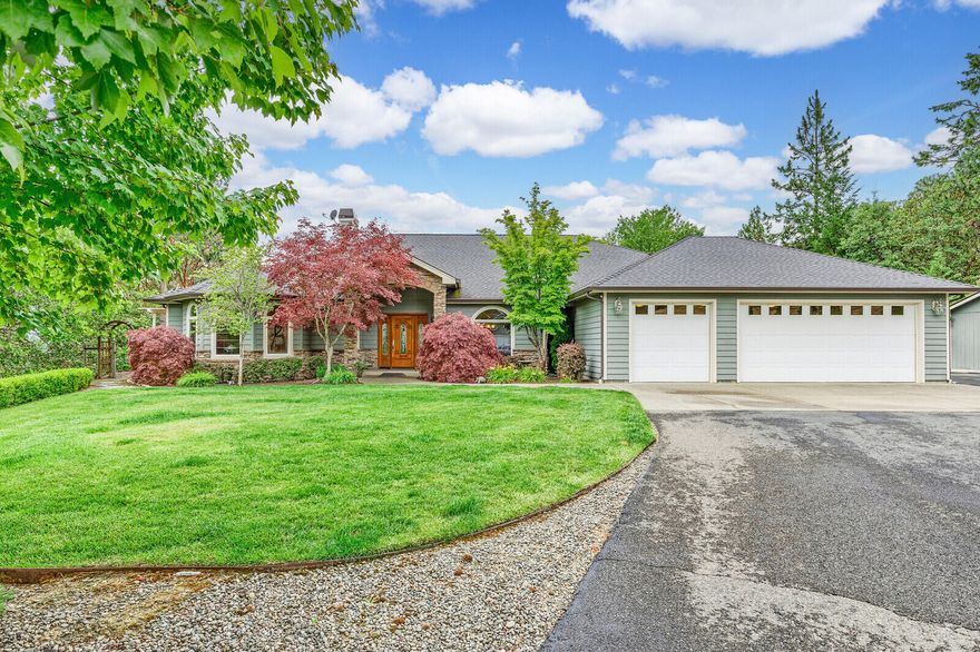 Spectacular view property with gorgeous custom home & shop on 6.07 acres!  The home, built to take full advantage of the breathtaking views, feat 3540 sq ft, 4 beds & 4 full baths.  Attention to detail shows in the crown molding, arched doorways & built-ins.  Formal living room wi f/p & double French doors leading to the covered patio, formal dining rm, gourmet kitchen with granite countertops, island, pantry, dbl ovens, family room with built-in entertainment ct. & f/p.  Relax in the master ste, wi luxury bath, dual closets, f/p & just outside is the hot tub gazebo! The back yard is an entertainer's dream...in ground, solar heated, salt water pool with waterfalls, huge covered patio, outdoor kitchen with built-in BBQ, sink & tile counters/bar. Host a fabulous party as your guests meander to various sitting areas across the expansive lawn to enjoy the views. Other ext features include 3 car attached garage, separate shop with finished bonus rm abv & walking trails thruout the 6 acres.