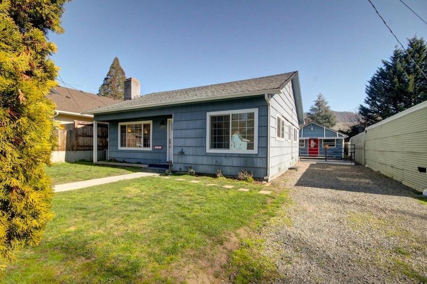 Charming cottage on large lot just one block from historic downtown! Huge RV parking, plus possible two-family setup with a detached additional dwelling unit (or convert to a spacious garage for all your toys)! This like-new home has been completely remodeled to include all-new flooring, paint and baseboards throughout the main home and dwelling unit. All-new kitchen and laundry room boast custom soft-close maple cabinets, granite countertops, new stainless steel appliances, fixtures, lighting and more! New energy efficient vinyl windows throughout, new bathroom vanity and tub, new lighting and so much more including a brand new ductless heating and air system! Huge backyard and covered patio, great for entertaining. This home truly has it all and is priced to sell!