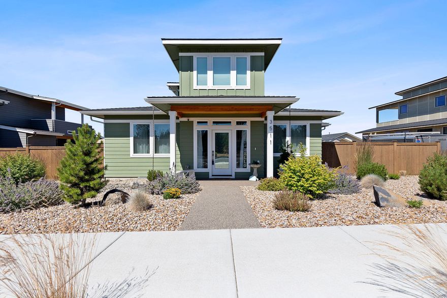 Welcome to this meticulously maintained & better than new home in the highly sought after Redtail Ridge neighborhood. Gorgeous 3 bed, 2.5 bath home feat. all the luxury & functionality you've been searching for, w/ spacious rooms, chef's kitchen, & exceptional outdoor space. If you're looking for modern living w/ breathtaking views, you've found your new home! Relax in your luxurious owner's suite w/ tile walk in shower, oversized walk in closet & on the main floor. A true retreat! The heart of this home is the gourmet kitchen featuring solid surface counters, SS appliances & lg island. Gas range, ample cabinetry & pantry make this the ideal for cooking or entertaining. Spacious, light filled LR w/ gas fireplace flows  into the kitchen and dining area. Upstairs family room wired for sound, private deck has Cascade views & office on main level. Oversized 3 car garage plus add'l storage shed w/ electric. Fenced & landscaped w/ backyard irrigation.