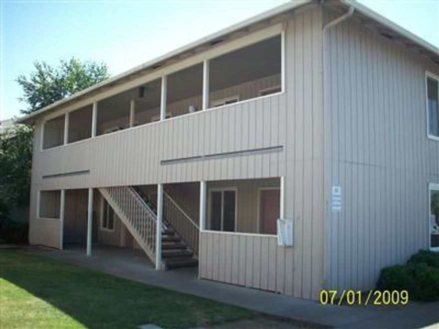 Great investment property! Each unit has 2 bedrooms, 1 bath with washer & dryer hookups. Storage closet on patio. Close to shopping & schools. New carpet & paint in all 4 units. Property sold AS IS.