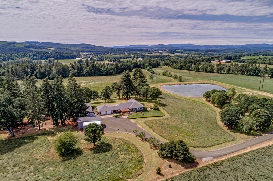 Private pristine property on over 74 acres in beautiful farmland abuts Mill Creek. 2791sf home 3
bedroom & 3 bath with gorgeous office. Owners Suite features wall of windows and 2 spectacular custom walk-in closets. Oversized 2 car garage with workshop and wine room. The 1760 Auxiliary studio features full bathroom, sauna, FS hot tub and full gym. Garage for RV, boat, cars and toys. Poultry coop. 60x70 Barn, 2 stall horse barn and tack room, pasture fenced and cross fenced, Seasonal Pond.