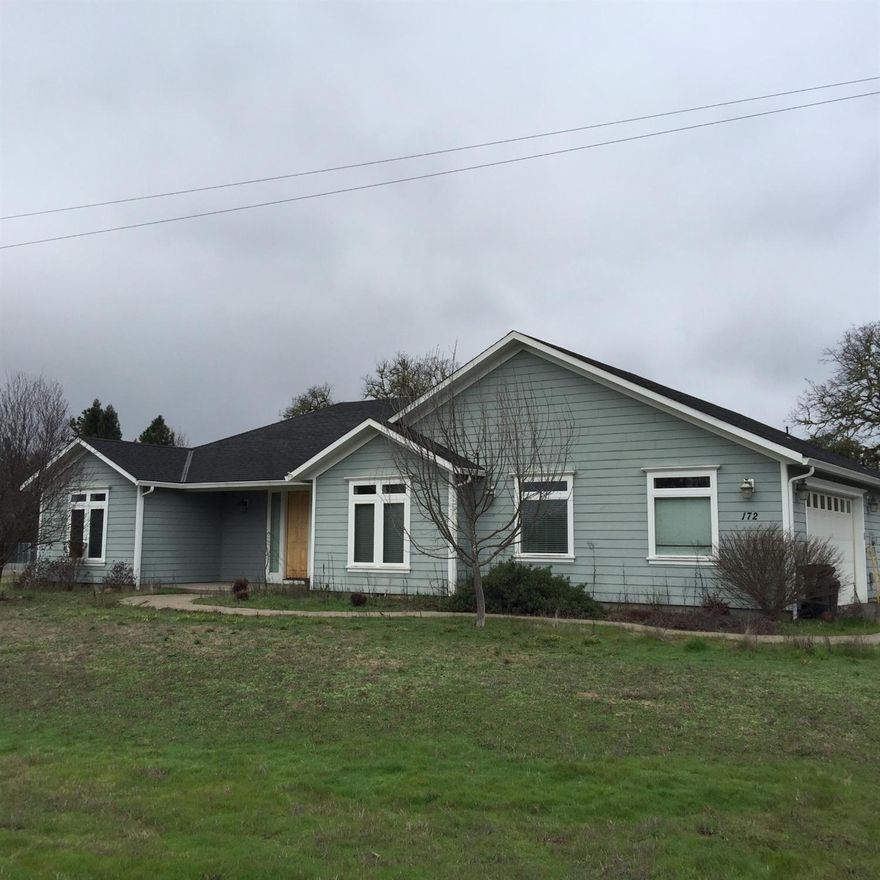 Hard to find combination of truly gorgeous craftsmanship and materials in newer construction on a usable acre in the country. Step into the dramatic formal entry to nearly 2200 sq ft of vaulted and extra high ceilings with rich appointments like scraped wood floors, tile, rich hardwood cabinets, slab granite kitchen counters, walk in closets, rich tile MBR shower, tile guest bath tub surround, tile counters, and high end fixtures. Generous use of half moon windows and carpet insets add to the rich feel. Nice patio off the dining area, double garage, paved entry driveway. All information is deemed reliable but not verified; anyone considering purchasing this property should perform their own investigation into the uses and condition of the property.