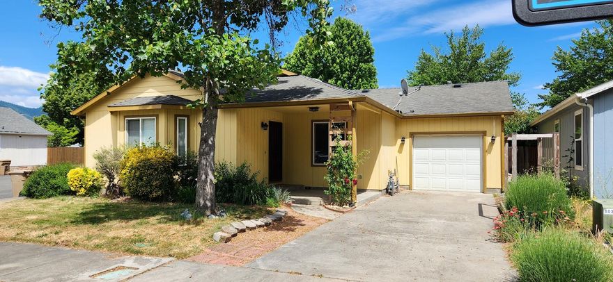 Welcome to your 1240 sqft., 3 bedroom, 2 bath home. This home features a central vac system,  gas for cooking and heating your water. The home has new interior paint & has been well  maintained. Kitchen features newer plank tile flooring, skylight, all appliances and ample cabinetry. There's counter seating as well as a dining area. Beautiful hardwood floors in living room with vaulted ceiling, fans, sound system and bay window. Primary suite has a generous walk in closet and slider to the outdoor patio area. Both bathrooms have tile flooring and tub/shower combos. Backyard is fully fenced with a patio for your BBQ and there's easy maintenance landscaping with sprinkler system in both front and back yards. To top it off there is a 1 car finished garage.