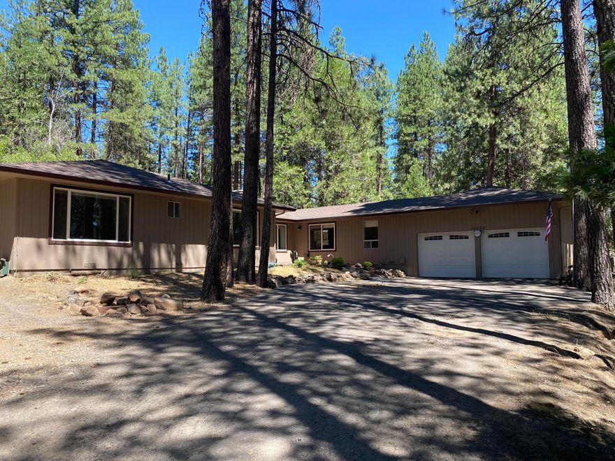 Take a look at this VERY nice home on 2.03 Acres. 3 bedroom 2.5 bath offering 2564 SQ. Ft. Double door entry, spacious foyer. Large living area with floor to ceiling windows, pellet stove. Separate dining room with a Sunroom off the dining room. 
The kitchen is completely updated, granite tops, top of the line stainless appliances. Double ovens, 3 door refrigerator, pantry and tons of storage space. Garden window in the kitchen.
Large laundry room with sink and newer washer and dryer stay. Massive main suite with dressing room and attached bathroom. French doors leading to a deck for your relaxation. Bedroom 2 has access to hall bathroom. This home has central A/C and gas heat. Large oversized garage, with 220, workshop in the back with bathroom. Inground sprinklers front and back, paved circular driveway, Gutters,  Roof approx 5 years old, newer exterior paint.