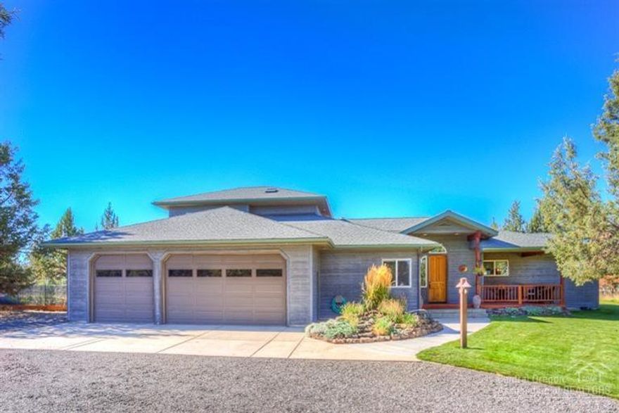 Custom home w/BIG mtn views. Cedar sided home, mahogany decking & 9' door/ceilings welcome you. Arched doorway leads to the spacious master suite w/vaulted ceiling, accent lighting, soaking tub, door to the patio. The living room features vaulted ceilings with a wall of windows. Large dining/kitchen area w/bay window, kitchen work island, Hickory cabinets with under/above lighting, walk-in pantry. Raised panel solid fir doors, vacuum system, security gated entrance. Garage has 220 power/400 amp servic