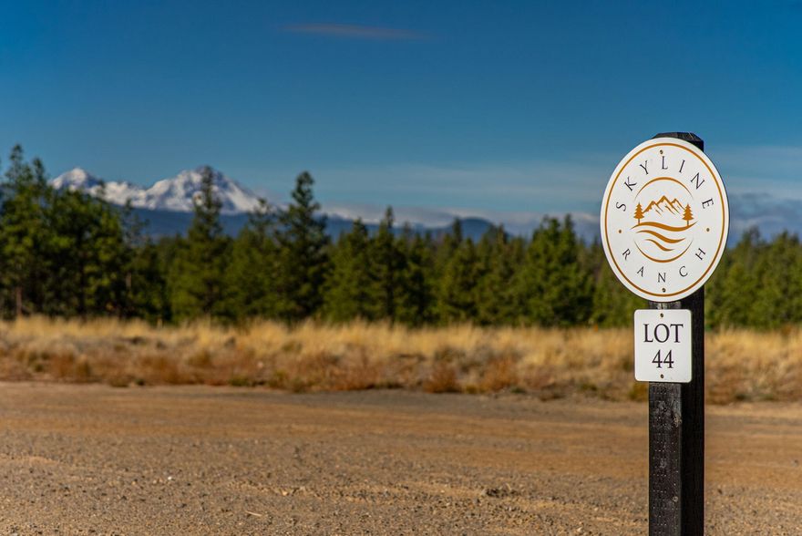 Discover the perfect setting to build your dream home on this spacious 2.5-acre lot in Skyline Ranch, one of the most desirable and  private communities in NW Bend. Enjoy breathtaking Cascade Mountain views (Mt Bachelor, Broken Top, Three Sisters, Mt Washington and more) as your everyday backdrop, with level terrain offering the ideal canvas for your custom build. Nestled just outside the city limits yet close to schools, Northwest Crossing, and downtown Bend, this property blends beauty, privacy along with convenience. Skyline Ranch backs directly to Bend's iconic Shevlin Park, offering endless adventures with access to trails, Tumalo Creek  and all the natural beauty this area is known for. Power, Bend city water, and Cascade Natural Gas are available at the lot—everything you need to start creating your Central Oregon retreat.