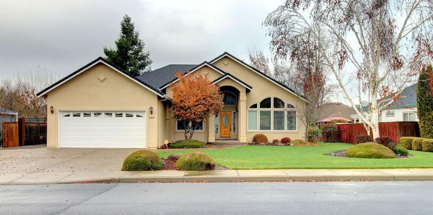 This immaculate single level home in the friendly Eagle Point Golf Community features an open floor concept of 1636 easy-maintenance sq ft, 3 bedrooms, 2 bathrooms offers marble entry way, hardwood floors in the kitchen, large windows, soaring ceilings and skylights illuminate natural light throughout. Large living room, spacious kitchen has granite counters. Master suite features a ceiling fan, coffered ceilings, bathroom with granite counter tops and dual sinks, linen cabinets and extra large walk-in closet. The front bedroom with arch topped window makes a perfect den. Privacy fenced backyard with paved patio, professionally maintained landscape yard and automatic sprinkler system. Finished 2 car garage. Enjoy the community waking paths and surrounding mountain views. This home shows pride of ownership and is clean as a whistle ready to move right in.