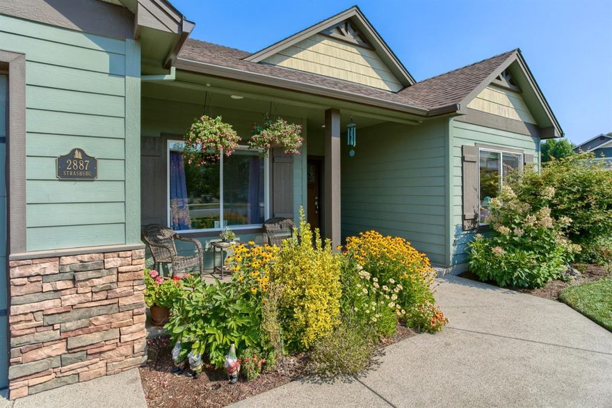 This wonderful 3 bedroom 2 bath 1,621 square foot home sits in a very desirable neighborhood in East Medford. Perfectly maintained inside and out, this home features stunning engineered hardwood flooring, granite counters, gas range, stainless appliances, gas fireplace in the living room, plenty of nice dark cabinets, Large master bedroom with walk in closet, ceiling fan and amazing master bath with jetted tub, separate shower and double sinks. Outside there is a huge back yard with a covered patio, a large deck, and a beautiful lawn. Fantastic landscaping and mature trees are the finishing touches that provide enjoyment and privacy. This one has it all.
