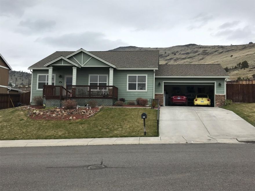 Beautiful View of Mt Shasta! This well kept 3 bedroom 2 bath home features an Open Floor plan, and sits up overlooking the city lights! Large rear deck with complete landscaping and sprinkler system.
