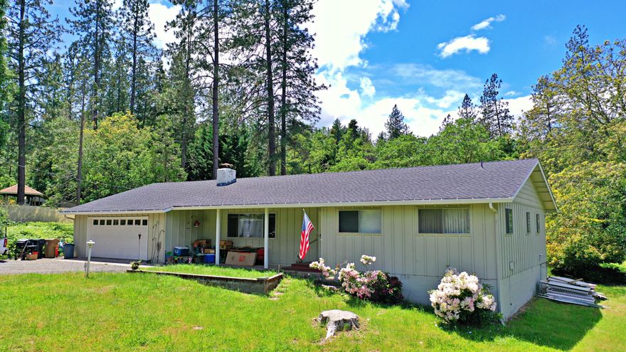 Here is a well maintained 4 bedroom, 2 1/2 bathroom home on 2.03 acres located on a quiet dead-end road in the Colonial Valley.  The home has a large front & back yard with a nice covered back porch and covered front patio, the family room has a wood fireplace, a spacious dining area off the kitchen and room to park an RV or boat.
 The roof of the home was replaced approx 2018 and exterior was painted approx 2019.  The 4 hr well flow performed on 6/27/2022 came in @ 11.1 GPM. The home is in great condition, it just needs some modern interior updating.