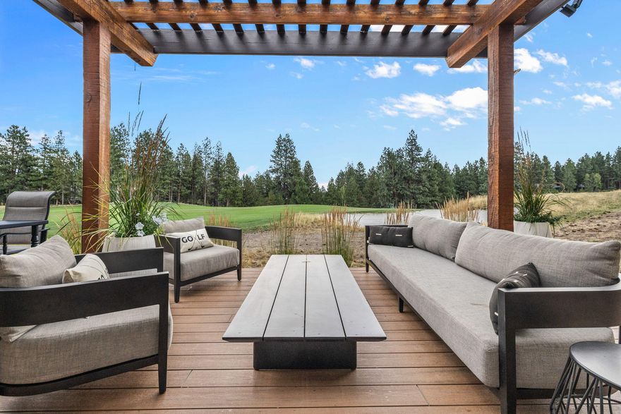 Beautifully updated Broken Top townhome offers breathtaking views of the 18th fairway from nearly every room. A charming covered front porch welcomes you to elegantly comfortable interiors. The sunlit kitchen featuring a waterfall-edge granite island/brkfst bar and updated SS appliances, connects seamlessly to dining & living areas, with natural light flooding thru the windows, creating a bright & inviting atmosphere. With direct access to the patio, the great-room, accentuated by linear fireplace & designer lighting, offers uninterrupted views of the fairway; just open the doors to extend your living space outdoors w/custom pergola allowing you to enjoy the surroundings any time of day. The main level primary suite offers picturesque views & direct access to the private patio, allowing you to relish the outdoor setting and a spa-like bath w/ soaking tub, dual vanities, & custom lighting enhancing the ambiance. Upper-level features two full-en-suite guest rooms for family and guests.