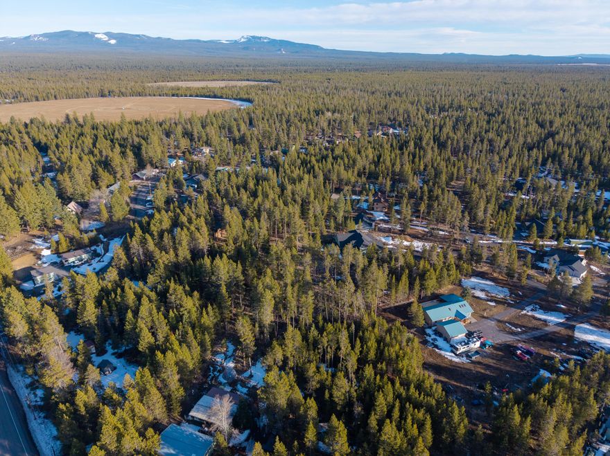 Seize the opportunity to own 1.22 acres of pristine land in the sought-after OWW community of Bend, Oregon. This spacious, level lot is surrounded by towering Ponderosa pines, offering a serene forest setting with ample privacy. Whether you're envisioning a custom-built home, vacation retreat, or investment property, this parcel provides endless possibilities.

Location is everything—this lot is just minutes from the Deschutes River, where you can enjoy kayaking, fishing, and scenic hikes along the water. The vibrant Sunriver Resort is a short drive away, offering world-class golf, dining, and year-round recreational activities. With community water and utilities available at the street, building is made simple, and with its paved road access, you'll enjoy both convenience and tranquility. Whether you're looking for a full-time residence or a weekend escape, this expansive property offers the best of Central Oregon living.
Embrace the opportunity