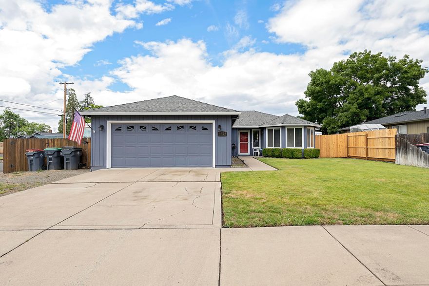 Come see this beautifully cared for corner lot home with huge RV parking and RV hookups!    You will love this location  that is close to shopping, medical facilities and South Medford High School!  Once you enter your new home you will immediately noticed how open, bright and spacious it feels.  The engineered hardwood flooring and paint colors give it a nice updated feeling.  In the kitchen you will notice the newer glass top stove and the corner windows that help bring the outdoors indoors with the slider that goes out to the fully fenced backyard and patio.  The homes two skylights add to the open and bright feel of your new home.  The master suite with its coffered ceiling and ceiling fan provide the perfect retreat to escape your every day cares.   Come see this affordable, well cared for home!