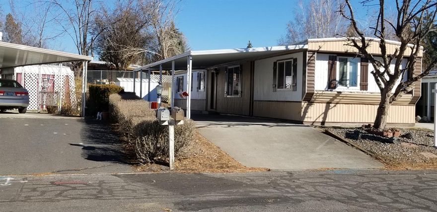 Own your own home and land!! Great location situated in the Henley School District. Quiet cul de sac. Affordable and in good condition. Newer carpet, vinyl and updated HVAC system installed in 2014. Large walk-in closet off the master bedroom. Heat tape under home also added to insure pipes stay unfrozen in the winter. Nice carport and extra concrete parking area created as well. You own the land, so no park fees associated. Don't miss this opportunity to purchase this well taken care of home in a great location.