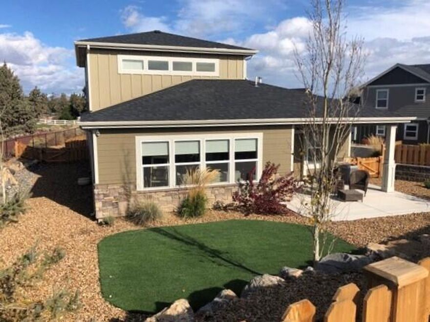 A free standing home in the newer condominium section of The Greens. A corner lot with great southern exposure and backs to the canal, complete with a nice sized, wood fenced yard. A bright, upgraded kitchen complete with Stainless Steel Appliances, Quartz Countertops and Luxury Vinyl Plank Floors. A good sized Master Suite is on the Main Floor with both a Guest Bedroom and Office Loft upstairs. Just a block away is the Greens Golf Course and Walking Trails all around you. A short distance to downtown Redmond, the Airport, Restaurants & the Hospital. A conveniently located beautiful home.