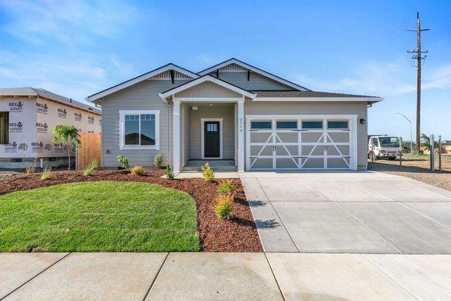 Discover the perfect blend of modern design and timeless comfort with this beautifully crafted new construction home by PacTrend Homes. Spanning 1,560 square feet, this thoughtfully designed residence offers three spacious bedrooms and two elegant bathrooms, tailored to fit your lifestyle.

Step inside to experience an open and split floorplan that maximizes both space and privacy. Whether you're entertaining guests or enjoying a quiet evening, the seamless flow of this home creates an inviting atmosphere for every occasion.

The heart of the home is the kitchen, boasting sleek granite countertops that are as durable as they are stylish. The open-concept design ensures you're always connected with family and friends, while the high-quality finishes add a touch of sophistication.