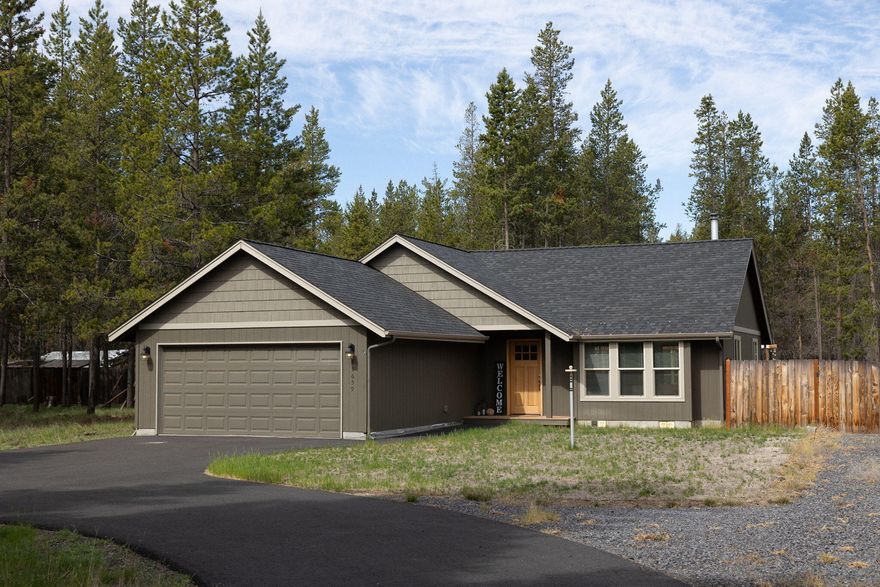 Discover your Bend Basecamp—priced just under $600K! Built in 2016, this Northwest-style home offers 3 bedrooms, 2 bathrooms, and 1,351 sq ft of modern comfort on nearly half an acre. The open-concept design centers around a cozy fireplace, with a bright kitchen and dining area perfect for gatherings. A spacious 2-car garage provides room for all your Central Oregon gear. Located only 23 miles from Mt. Bachelor and minutes from Sunriver and Bend, it's the ideal launch point for skiing, hiking, biking, and fishing. Owners here enjoy private POA amenities including a marina on the Deschutes River, trail access, and snow removal for year-round ease. With newer construction, outdoor adventure at your doorstep, and exceptional community benefits, this property is ready to be your four-season retreat. Experience the perfect balance of tranquility and recreation—your Bend Basecamp awaits.