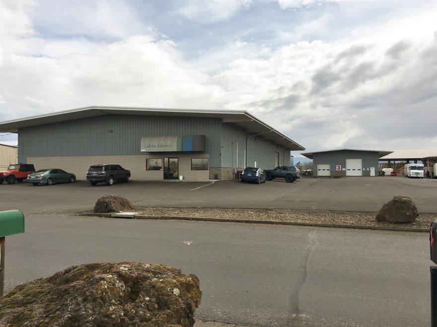 Fantastic Investor Opportunity!! Two warehouses on one lot with excellent long term rental history, and great tenants in place. The front warehouse is 12000 sq. ft. and has multiple offices, break-room, bathroom, and a mezzanine showroom built out. This warehouse has a large free span warehouse area used for tenant inventory and a fenced in yard/delivery area. The back warehouse is 5000 sq. ft. and is currently used as storage by a tenant of multiple buildings within the park. Listing agent has an ownership interest in property.