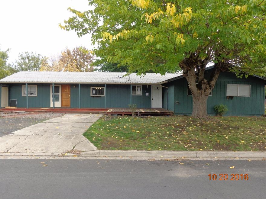 Single Story home. Living room, Dining area, Galley Kitchen. Large back yard. Close to schools, downtown and shopping. 3 bedrooms and 1.5 baths (county says 5 bdrms/2.5baths). The 2bdrms/1 bth on the left end on dwelling is required to be turn back into garage, per City of Eagle Point. See attachment for PAS requirements and WFHM offer submittal information in MLS document section.