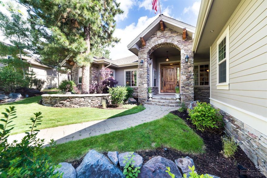 Come home Bend's Westside, close to NW Crossing, trails, mountain biking, schools, and downtown attractions. Coming up the walkway, you and your guests are greeted by the spectacular water feature. Quality construction and finishes are apparent as you enter the front door, with an impressive rotunda entryway and custom travertine mosaic tile. This spectacular custom home features a bright kitchen with large center island, oversized 4+car garage, game/media room, master BR separation, and much more!