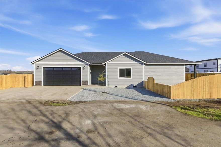 Pristine 2025 New Construction home nestled in the heart of Talent! Only minutes away from Ashland & near many landmarks! Settled on a generous 0.20-acre lot, this beautifully designed 3-bedroom, 2-bath home offers 1,654 sq ft of thoughtfully planned living space. Step inside to discover soaring 9-foot vaulted ceilings & an open-concept layout that effortlessly blends the kitchen, dining, & living areas—perfect for entertaining. The premium finishing touches will really showcase this home! Enjoy luxury vinyl plank throughout, granite countertops, tile showers, all electric appliances, central heating & cooling, & much more. The utility room and spacious laundry room add convenience to your everyday living. Every detail has been meticulously crafted to exceed expectations. There's still time to customize! Add your personal finishing touches before construction is complete & truly make it yours. Don't settle for standard when you can live in extraordinary!