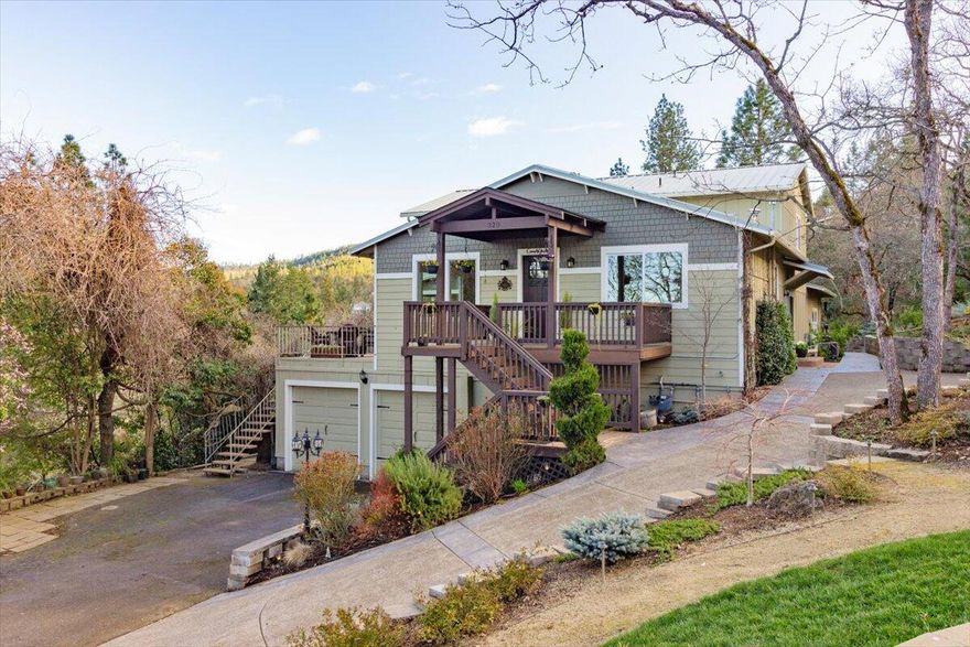 You can have it all in the heart of the wine country-the desirable Jacksonville! Spanning over 5660 sq ft, this home feat 5 beds + office, 3 full baths & 2 half baths. Gated driveway & the most breathtaking valley & vineyard views from every window. Open floor plan w soaring ceilings & separate living spaces provide modern versatility. The kitchen is complete w granite countertops, stainless steel appliances, & an eating bar. Main level master is spacious w/ wall of windows showcasing views, private balcony & stunning spa-like bathroom. Enjoy year round swimming w your own indoor pool/sunroom w/ skylights & tinted windows. Attached 2 car garage w shop space, hot tub, RV parking, ample space for gardening w raised beds & drip system. New solar panels installed, clean air system, metal roof & stunning landscaping feat fountain & waterfall. This is a rare opportunity to own a truly exceptional home in one of Jacksonville's most coveted locations. This home truly has it all!