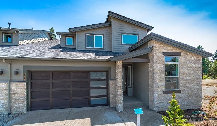 This beautiful home is luxury at it's finest. Walk into this home, listen to the River on the back deck and you won't want to leave. Charmingly placed between the Deschutes River & The River's Edge Golf course, you'll find the distinguished new home community, The Pointe at River's Edge. This beautiful town home sits on the Deschutes River. In this versatile Redford town home you'll experience a 2-story great room w/gas fireplace, main level master suite with soaking tub & w/in closet, upstairs guest suite, additional large bedroom & loft area with wet bar, large mud room/laundry, abundance of built-ins. You'll love the private access to the river that this community affords. Included are numerous Smart home features that complete this beautiful home. Please view attached virtual tour. Photos are of another Redford in this community.