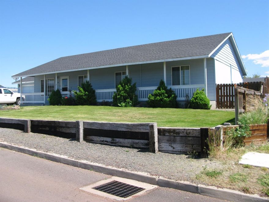 Nice home located on corner lot. Full front porch gives this 5 bedroom 2 bath home a country feel while being conveniently located in town. Vaulted ceiling open kitchen and gas fireplace are just some of the amenities this home has to offer. Central heat with heat pump makes this home a must see!!