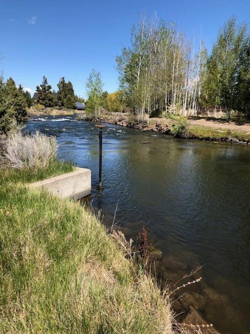 This breathtaking, private, almost half acre lot is the last one available in the peaceful N.E. neighborhood of Canal View. The large flat building site sits at the end of a cul-de-sac and already has a 6 ft. cedar fence on both sides of the lot. The large rock outcroppings provide an abundance of privacy. This incredible lot sits on the bank of the historic Pilot Butte canal. Conveniently location to schools, shopping, and parks. Utilities at street.