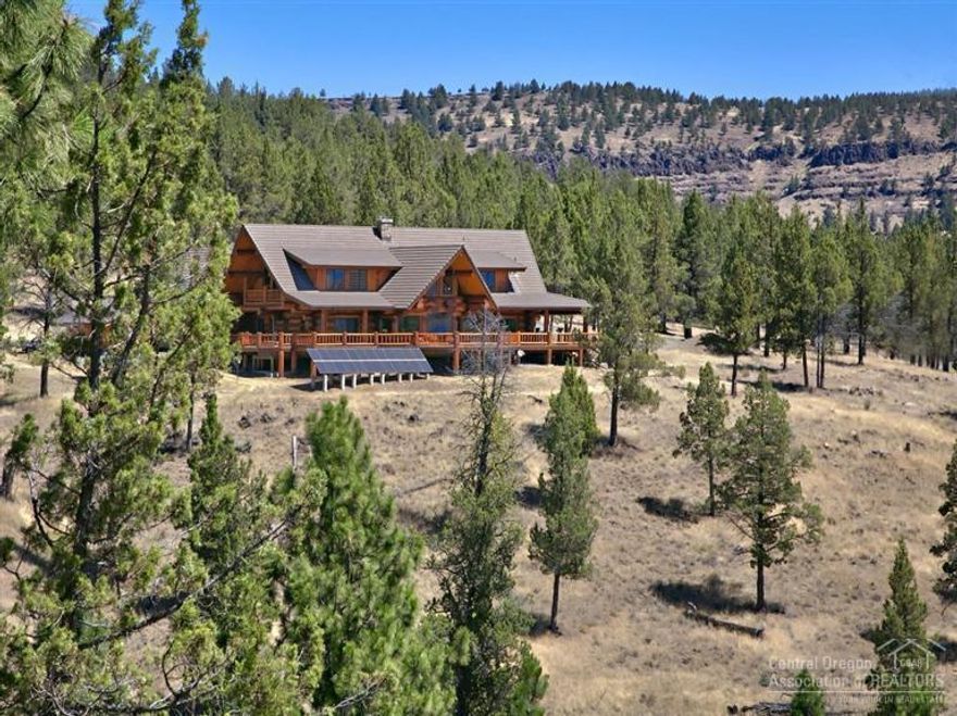 Grouse Mountain Lodge is a Recreational Ranch on 715 acres. Beautiful constructed Hand Scribed Log Home is 5262 sf, 3 bed, 3.5 bath featuring: Great Room, Stone Fireplace, Gourmet Kitchen, Formal Dining, Office, Bonus Room, Bedroom Suites, Screened Porch, Decks, Hot Tub & Backup Power System with spectacular views of the Strawberry Mountains. Shop/Barn-2496 sf. The scenic property is a wildlife sanctuary home to elk, deer etc. Varied terrain, forests & Beech Creek create a private mountain retreat.