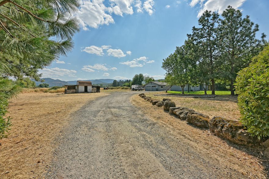 Welcome to your new property! Nestled in the heart of Central Point, this delightful 3-bedroom, 1.5-bathroom home offers space and convenience. Step inside 1312 sqft of living space, this property sits on 2.12 flat acres, providing endless possibilities for outdoor activities and 4-H projects.  Don't miss the opportunity to make this fantastic property your own. Whether you are a growing family seeking space and serenity or an investor looking for an excellent opportunity, this home offers it all. Schedule your private tour today and experience the charm of Central Point living at its finest!